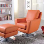 Оранжевое кресло и мягкий пуф.