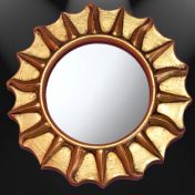 Солнечное зеркало в круглой раме